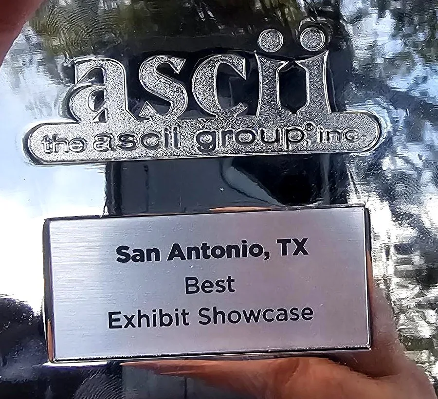Back of the ASCII Group award plaque reading San Antonio, TX, Best Exhibit Showcase
